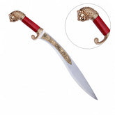 Macedonian sword prop replica on mossy rock – Alexander the Great ancient display collectible