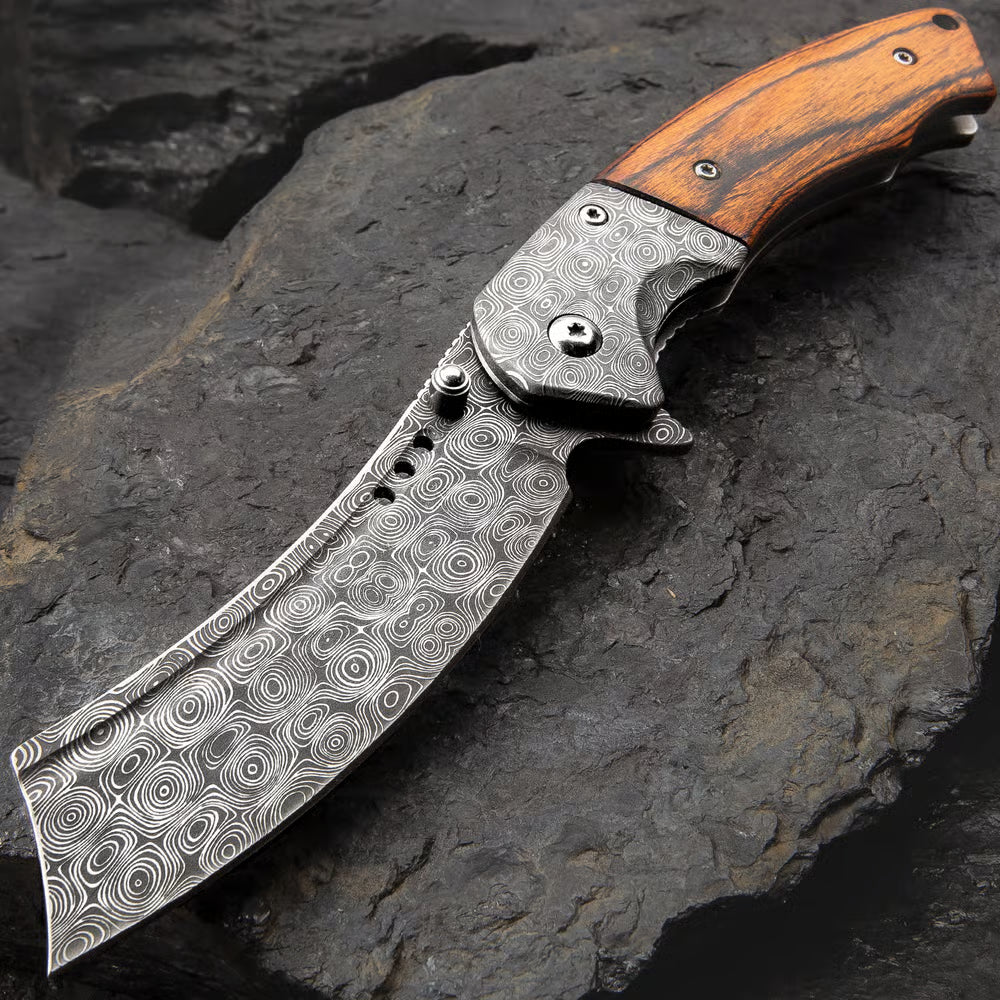 Boot Hill Razor pocket knife with Damascus pattern steel and wooden handle scales