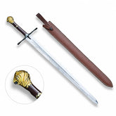 German Executioner Medieval Sword prop replica full view resting on mossy forest rock – historical collectible