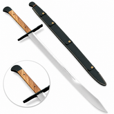 Grosse Messer sword prop replica blade tip close-up on mossy rock – Man at Arms display collectible