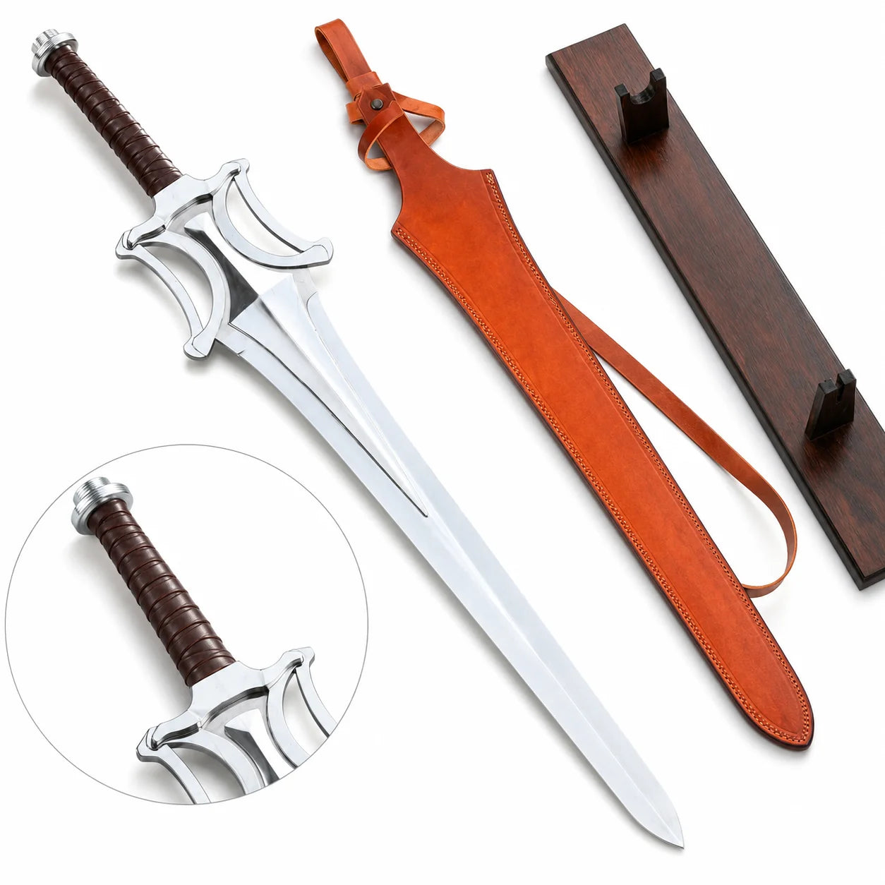 He-Man Power Sword prop replica full hero view on mossy rock with tan cognac leather scabbard belt loop and dark walnut wood display plaque notch holder showing silver chrome mirror-polish display finish blade double fuller groove open-work cross-guard four curved cutout arches and dark brown leather-wrapped handle – Masters of the Universe display collectible