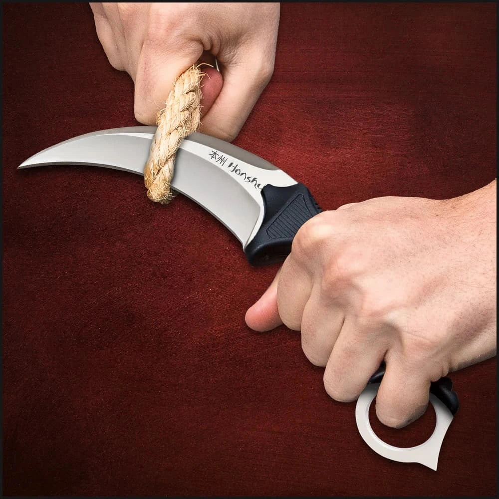 Honshu Karambit prop replica with shoulder harness and black silver finish