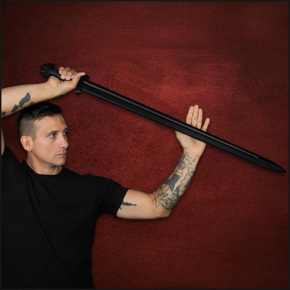 Man posing with Honshu Warrior's Journey black katana display sword – fan-inspired collectible