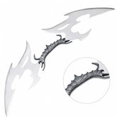 Klingon Valdris Blade prop replica top view on mossy rock – Star Trek display collectible