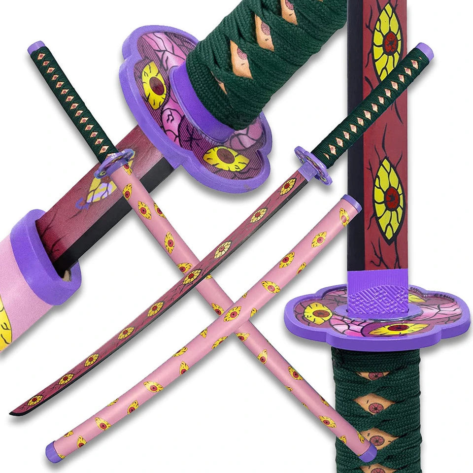 Close-up of Kokushibo Sword showing the pink eyeball blade design, green cord grip, and matching graphic scabbard