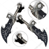 Kratos Norse black Blade of Chaos God of War prop replica displayed upright against mossy log in sunlit forest showing full matte black runic-engraved blade with ornate silver dragon skull crossguard black chain and detailed serpent guard in green jungle background