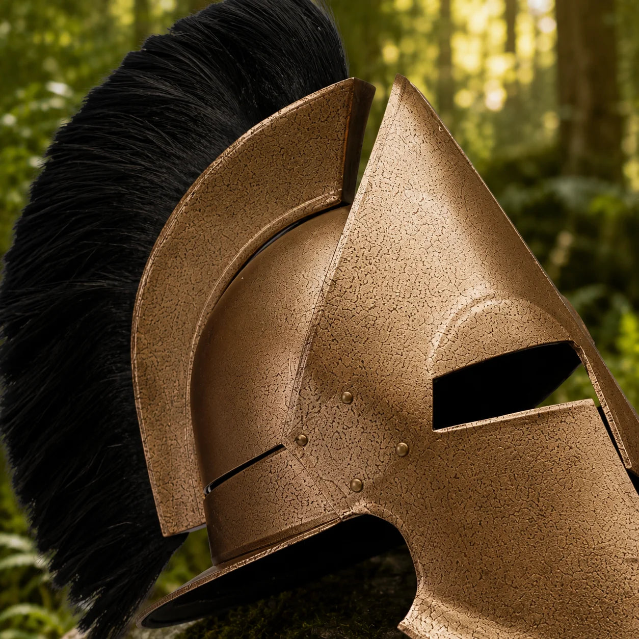 Spartan 300 Movie Helmet Replica with black hair crest displayed on a mossy rock, front-facing view