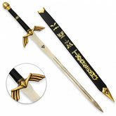 Close-up of gold-tone handle and winged guard on Link Ornate Prophecy Sword prop replica – Zelda fan collectible