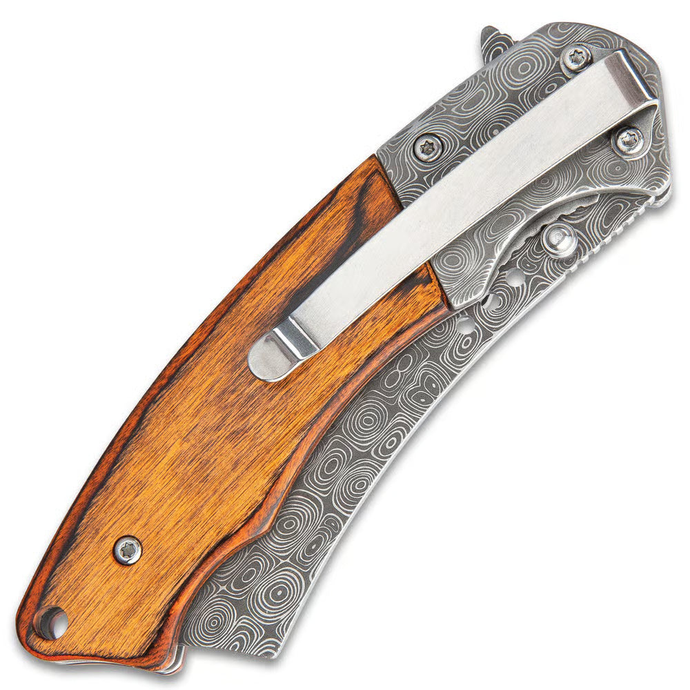 Boot Hill Razor pocket knife with Damascus pattern steel and wooden handle scales