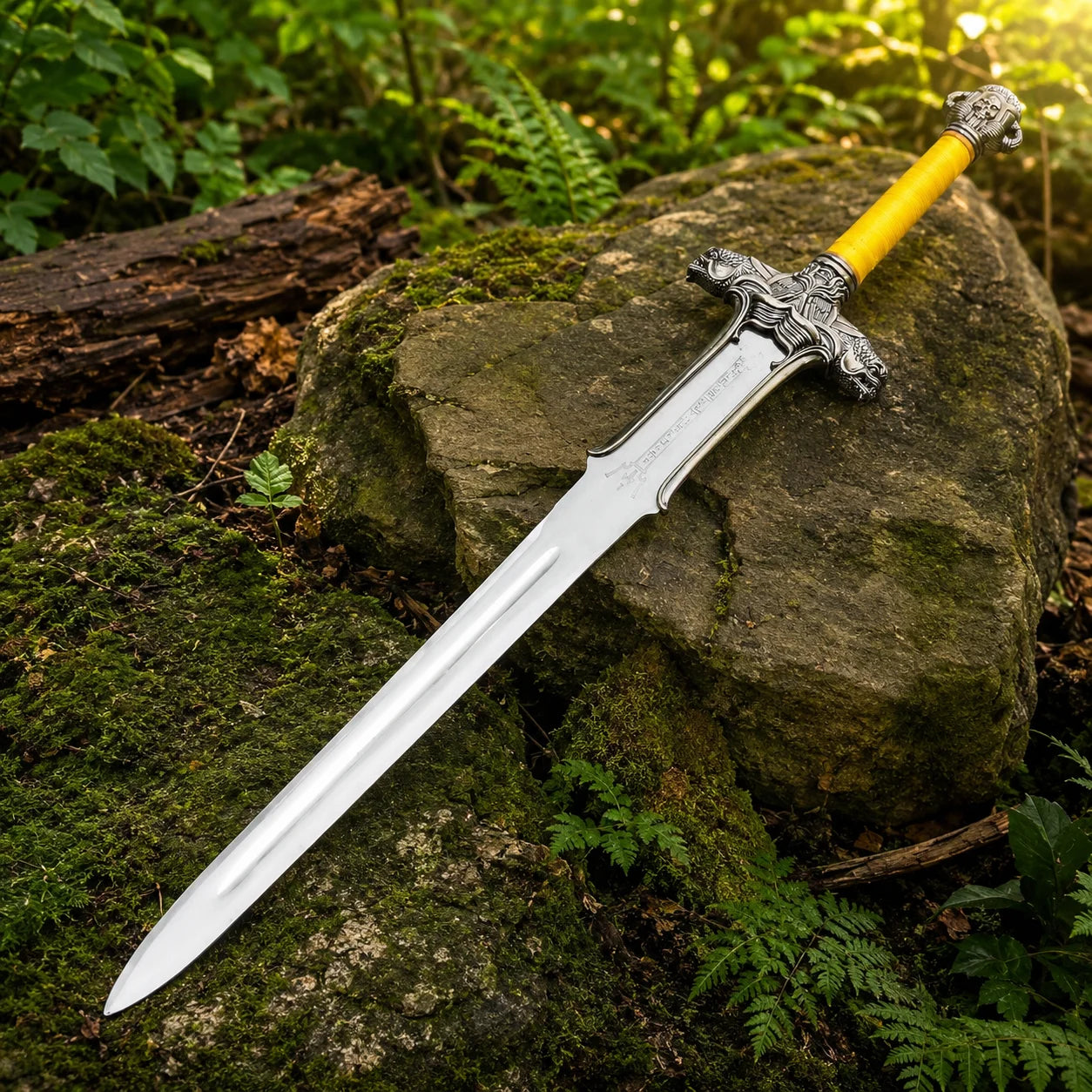 Conan Atlantean sword prop replica close-up of highly ornate silver dragon serpent crossguard with dragon heads on both quillons intricate 3D-cast scale textures bright yellow cord-wrapped grip and skull pommel on mossy log – Conan the Barbarian collectible