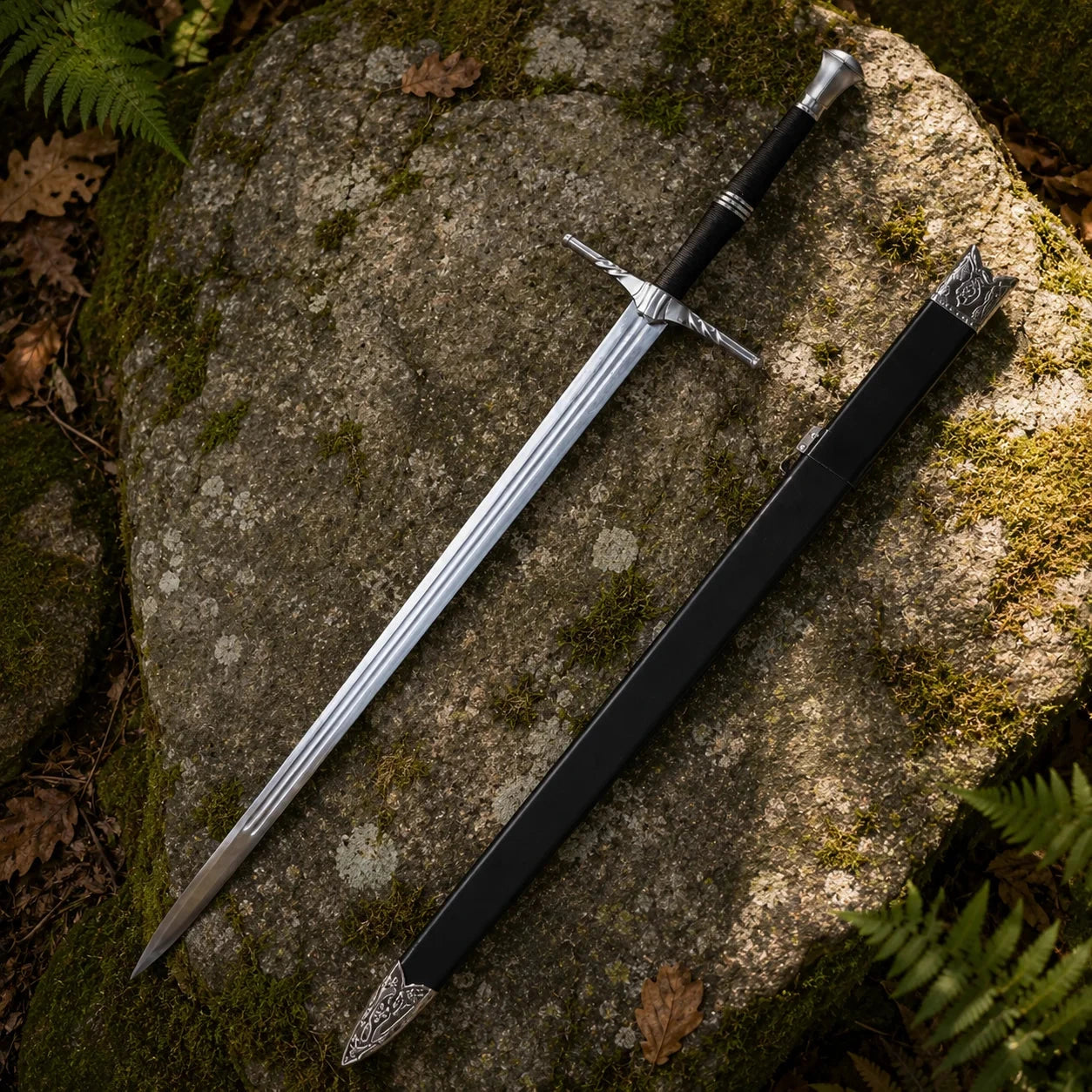 Geralt of Rivia steel sword prop replica full length diagonal propped on mossy log in sunlit fern forest showing complete polished silver blade with triple fuller grooves ornate silver crossguard twisted quillons and black cord-wrapped grip – The Witcher fan gift