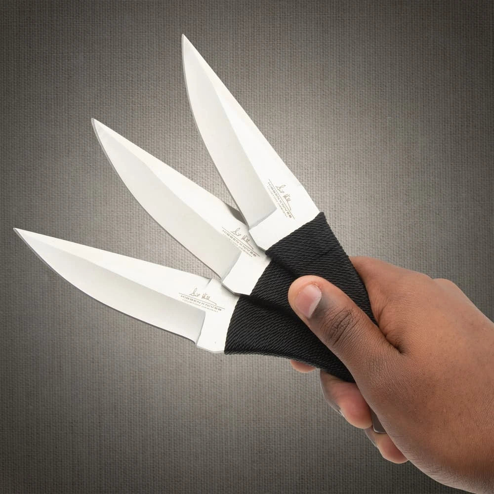 Gil Hibben large throwing knife triple set with stainless steel design and nylon sheath