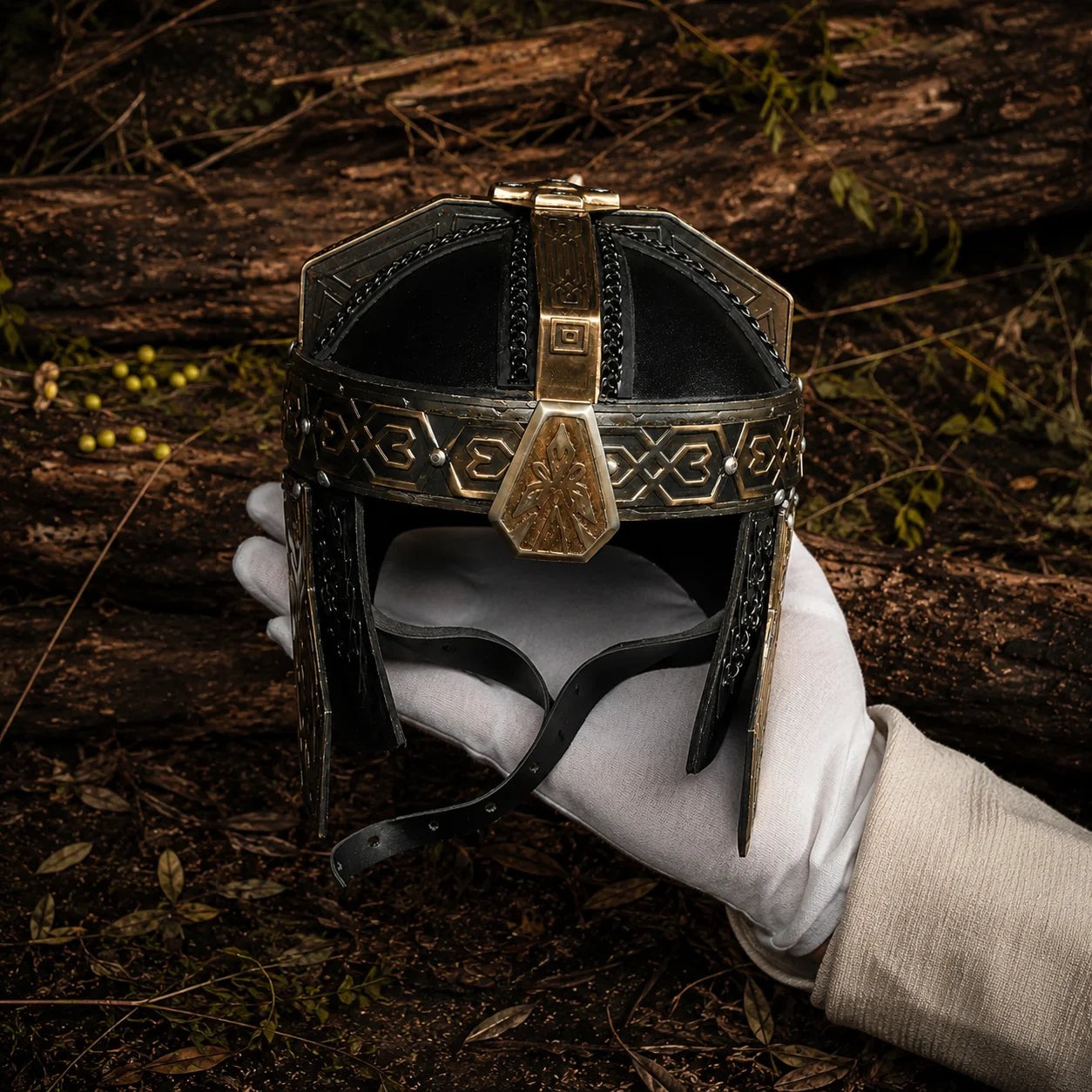 Gimli helmet prop replica three-quarter view on forest floor with black and gold Dwarven detailing – LOTR display collectible