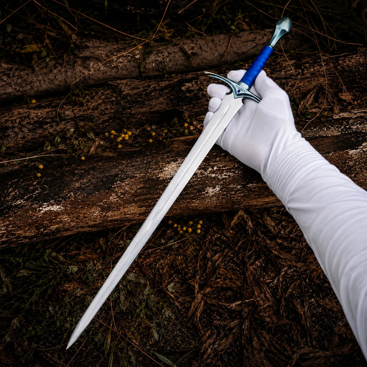 Universal Image Alt Text: Glamdring LOTR elven decorative display replica with blue ribbed grip and matching blue display sheath with metallic silver trim.