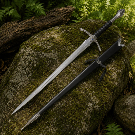 Glamdring sword of Gandalf prop replica full length on mossy boulder in sunlit forest showing complete double fuller blade ornate engraved silver crossguard and black leather ribbed grip – LOTR Hobbit collectible