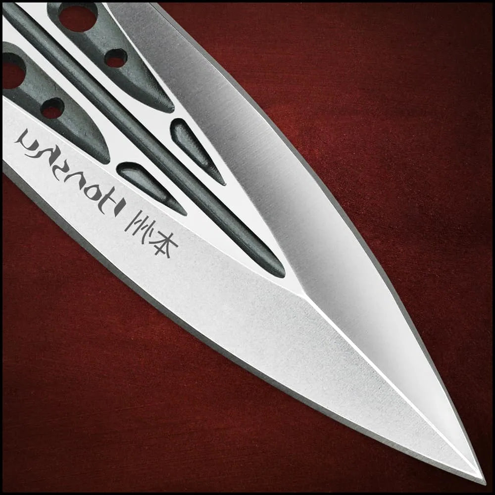 Close up of 3.375 inch 7Cr13 stainless steel blade on Honshu covert defense push dagger with groove and holes