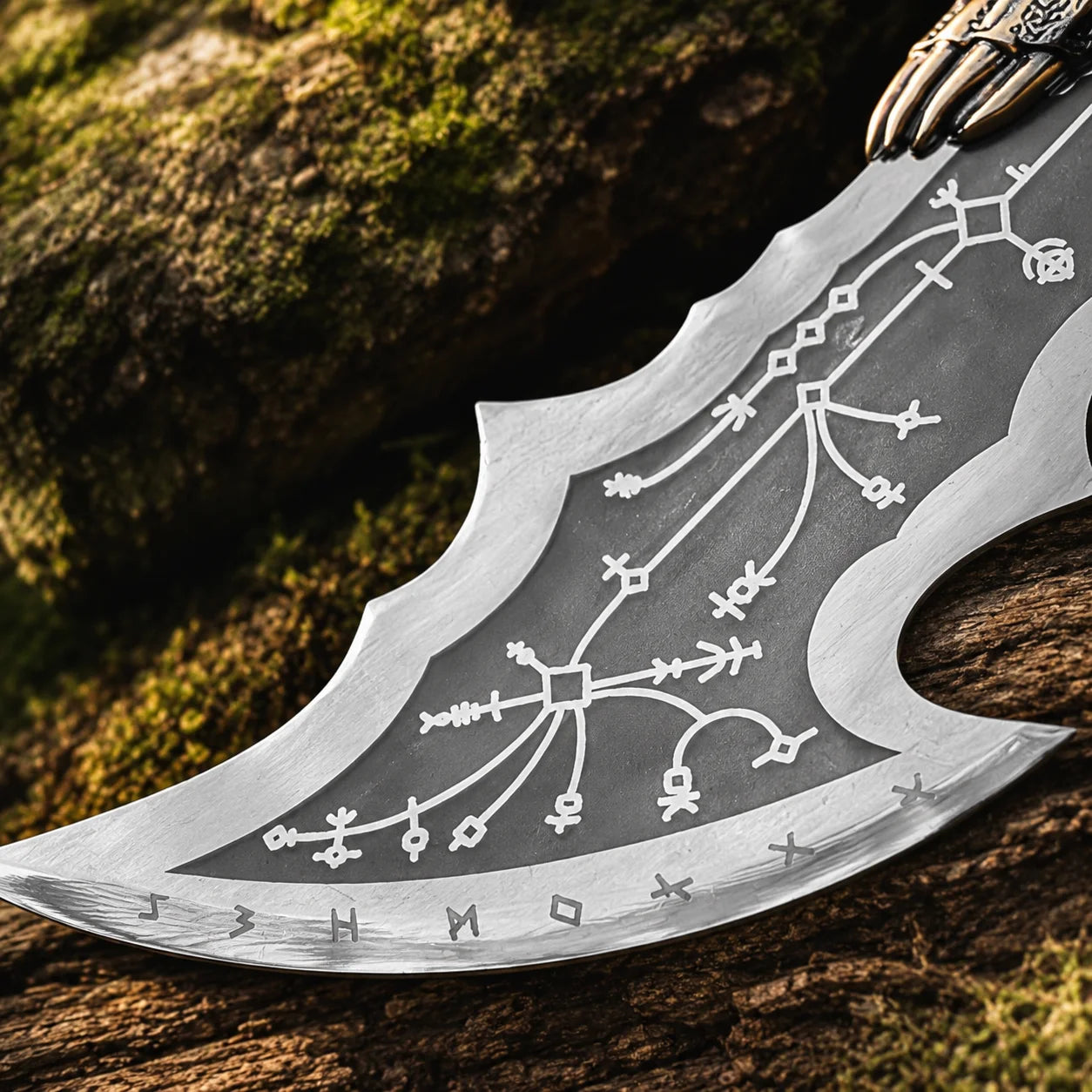 Close-up of Blade of Chaos dark steel flat on mossy rock showing detailed white runic constellation map with Norse symbols diamond nodes and Elder Futhark rune border etched across full blade surface on God of War prop replica