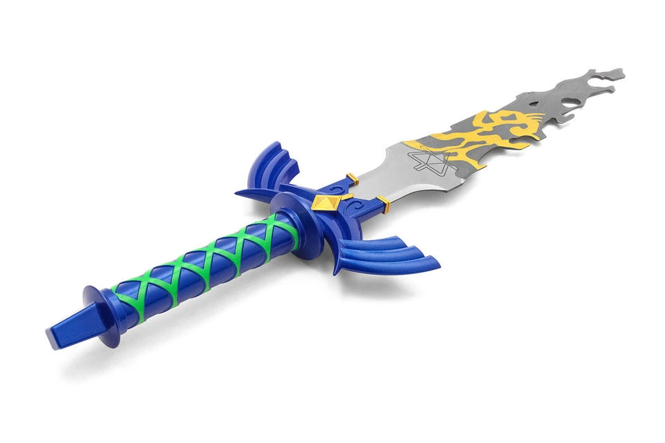 Close-up of the Link Broken Master Sword Zelda Tears of the Kingdom display collectible showcasing intricate fantasy engravings, premium stainless steel construction, emerald-inspired decorative details, textured ergonomic collector handle, and exceptional craftsmanship inspired by the legendary Master Sword.
