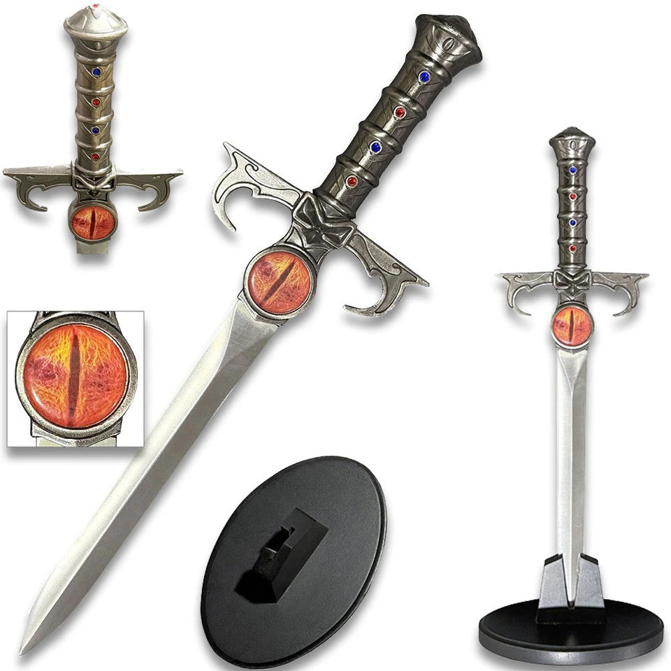 Lion-O Dagger of Omens ThunderCats collectible with red and blue jewel details displayed on the included tabletop stand