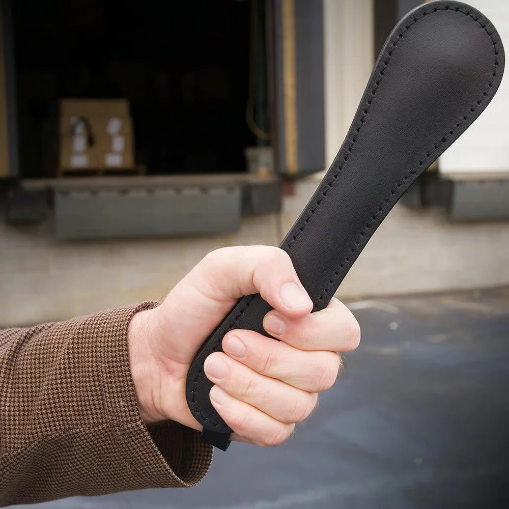 Premium Personal Self-Defense Leather Slapper Replica with strap.
