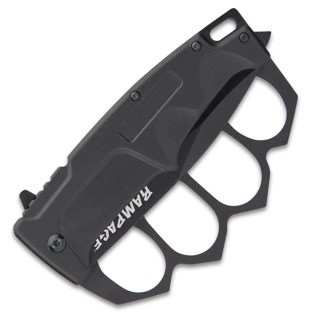 Rampage Trench Folding Knife black collector piece with black finish, knuckle-style handle, visible clip, screw details, and compact display presentation