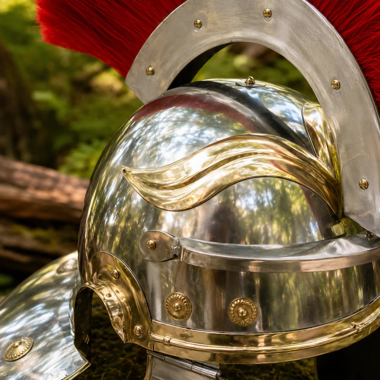 Roman Centurion helmet prop replica – rear angle showing neck guard and brass rivet detail on rocks
