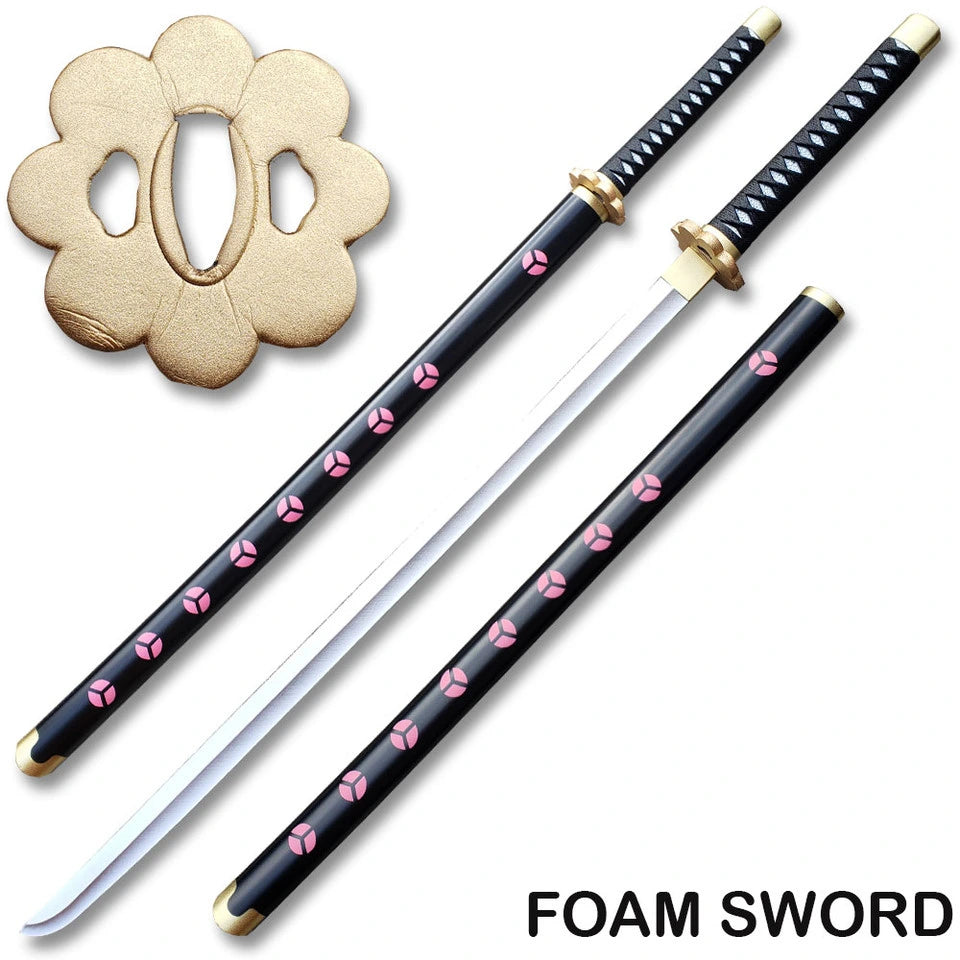Close-up of Zoro Shusui sword handle showing black nylon wrapping, white textured detailing and decorative anime styling