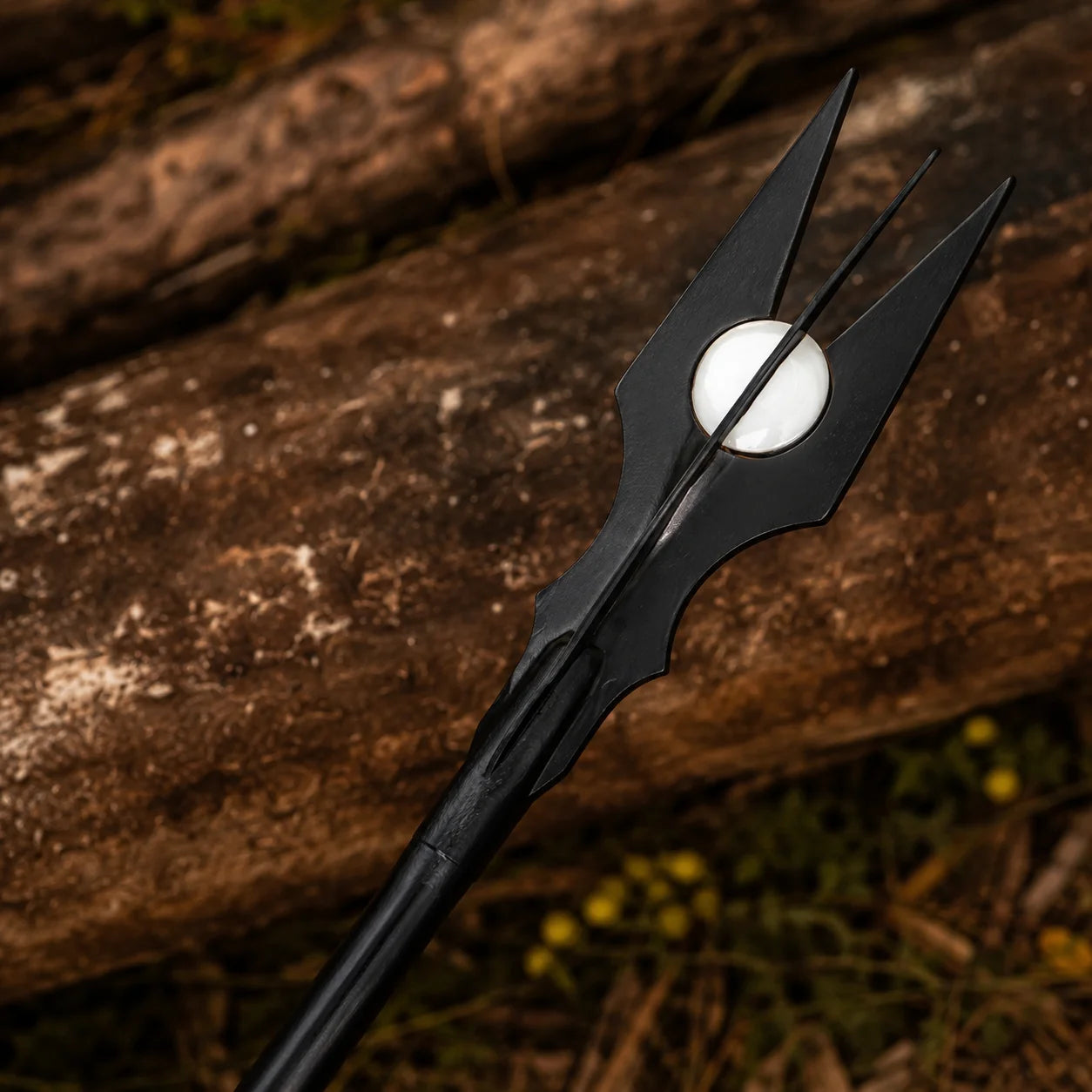 Saruman staff prop replica base grip detail on forest floor – Lord of the Rings display collectible