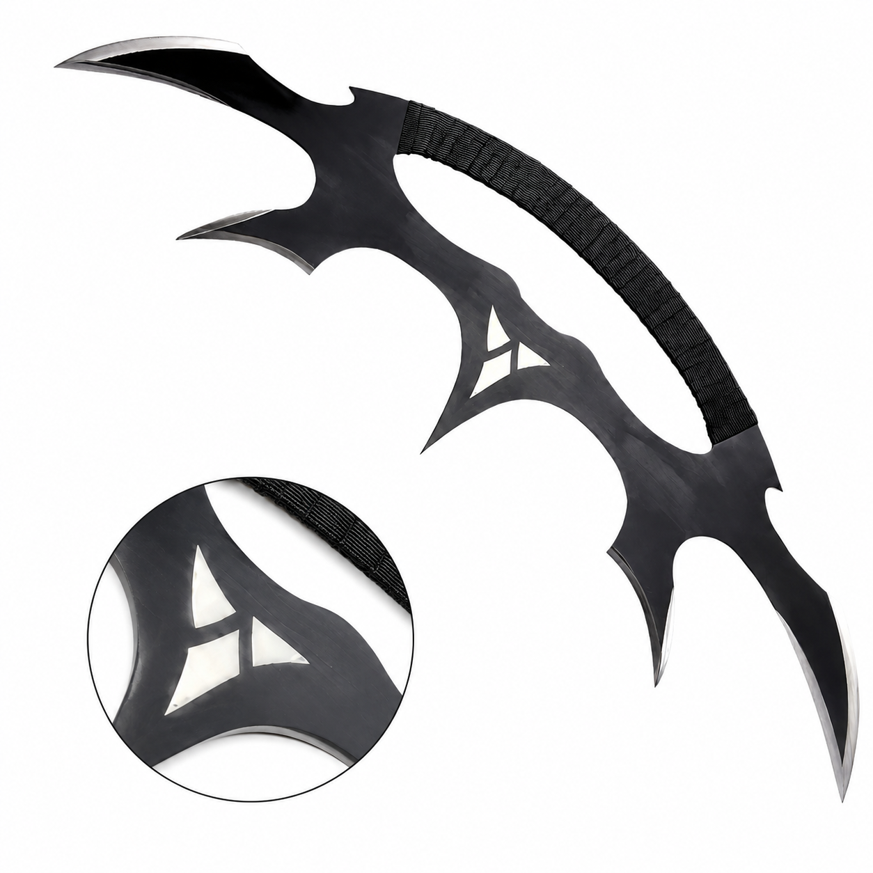 Star Trek Klingon Bat'leth collectible prop replica displayed on mossy rock in forest setting