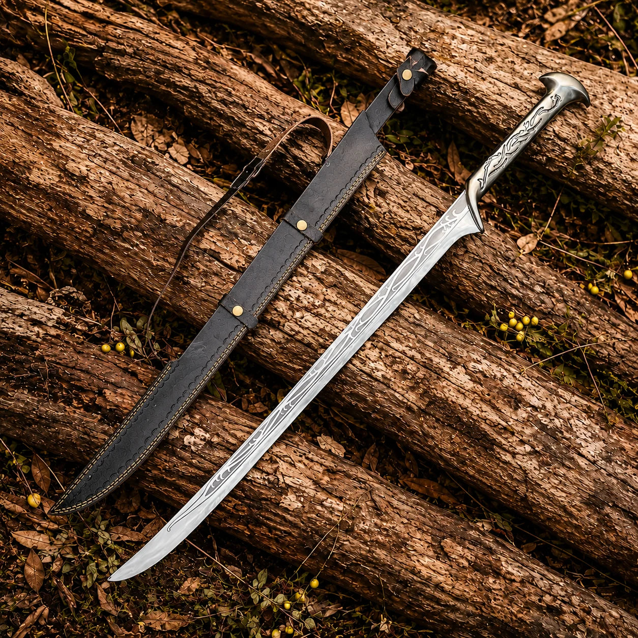 Thranduil Elven sword prop replica full length with black leather scabbard side by side on forest logs – Tolkien display collectible
