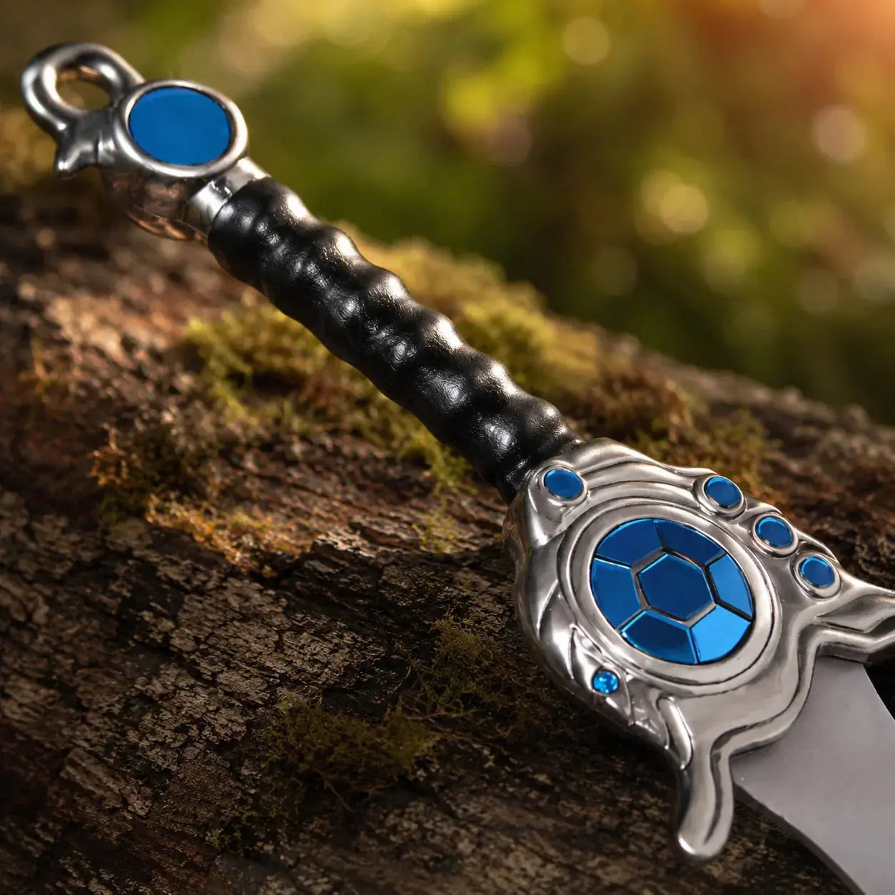Tryndamere Freljord Sword prop replica League of Legends lying flat on mossy stone surface outdoors