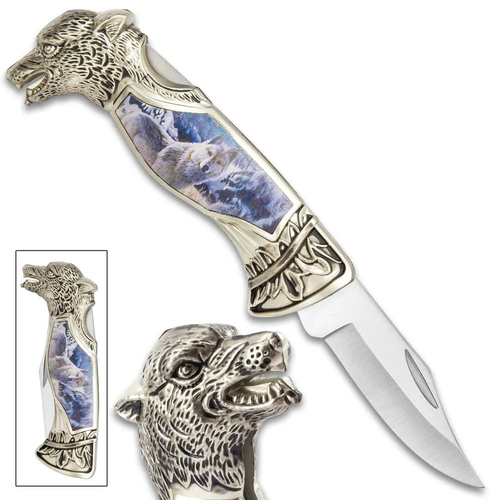 Winter wolf pocket knife with sculpted cast metal handle and winter scene artwork for collection