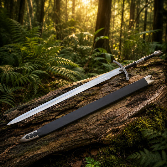 Witch-King sword prop replica silver blade and black scabbard side by side on mossy forest log in golden sunlight – LOTR fantasy collectible
